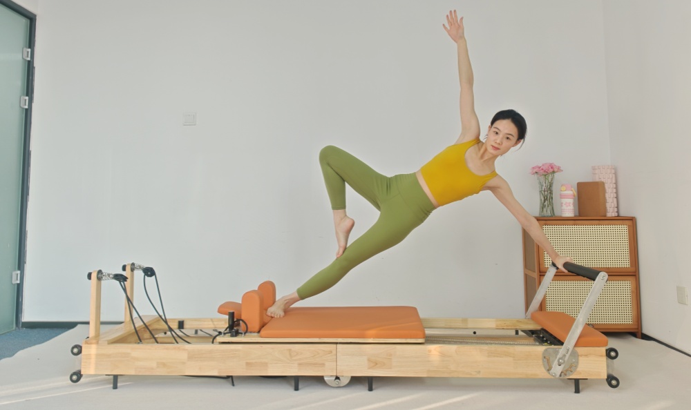 Il bilanciamento del corpo in legno pieghevole Pilates riformatore del letto centrale Il bilanciamento del corpo in legno pieghevole Pilates riformatore del letto centrale