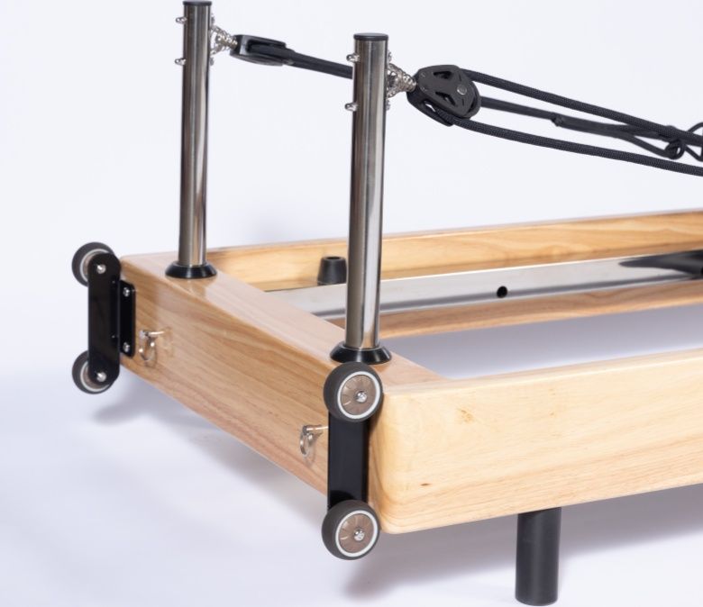 Riformatore di pilates pieghevoli senza giunto in quercia