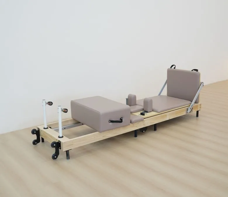 Riformatore di pilates pieghevoli senza giunto in quercia